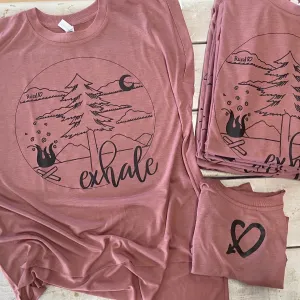 Rural Heart rolled muscle sleeve shirt by Rene’ Earnhardt. Soft, flowy and comfortable shirt in a pretty mauve color featuring an original outdoor theme artwork by team Rural Heart Artist!