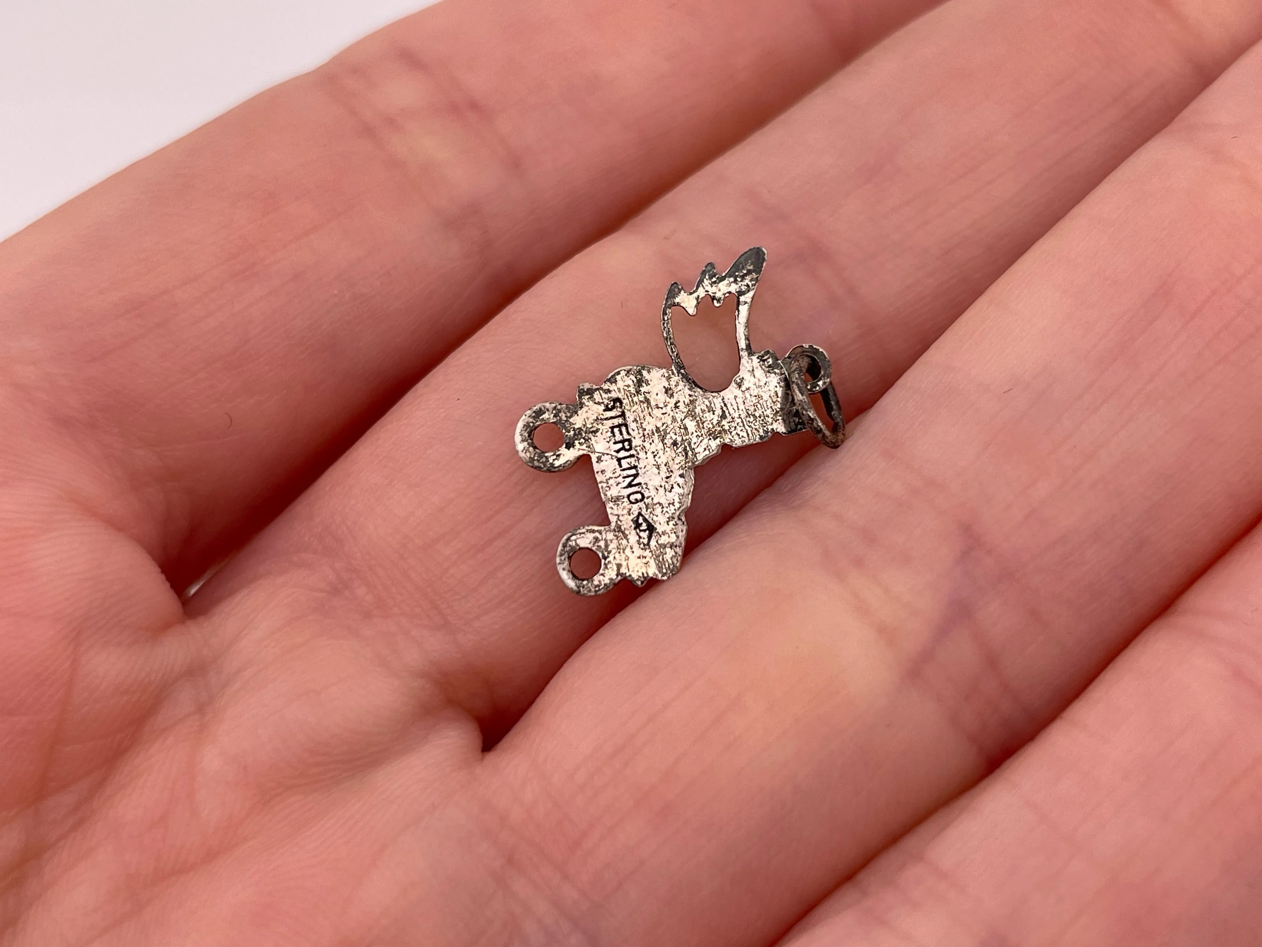 sterling silver lightweight roller skate wing pendant